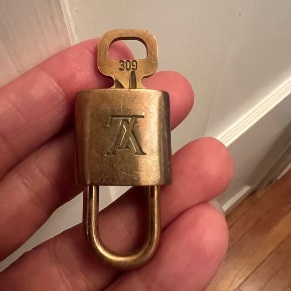 Louis Vuitton Gold Padlock - Picture 1 of 1